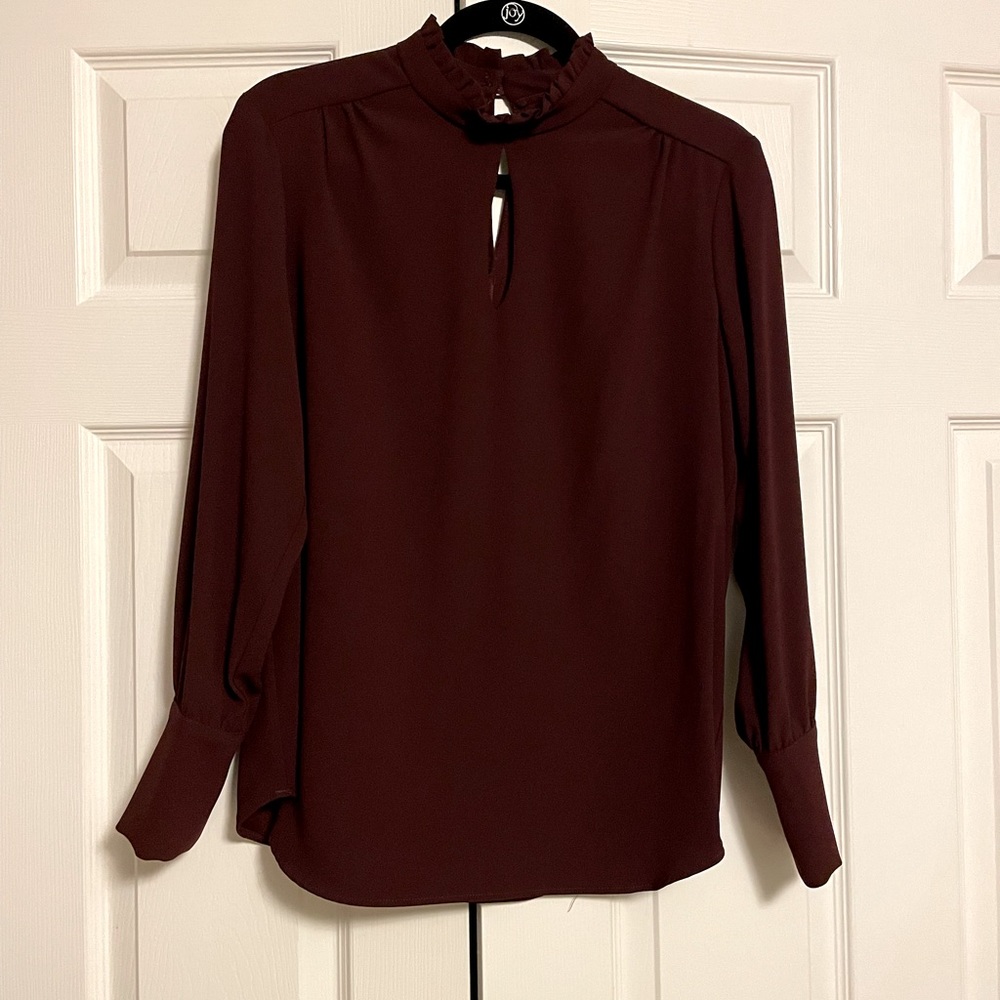 Flowing blouse burgundy ruffle neck slit in front/ back